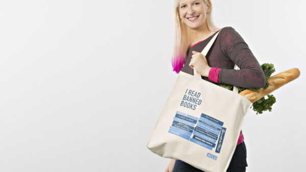 ACLU member holding a ACLU shopping bag