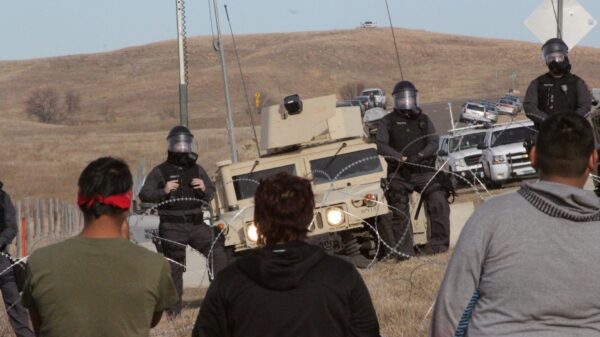 Image of Police and Water Protectors at Standing Rock