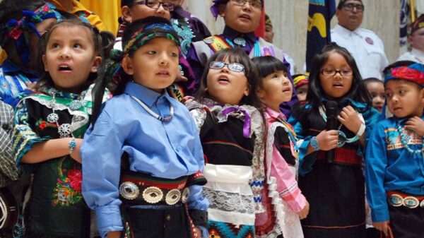 Children from the Zuni Pueblo lead the U.S. pledge of allegiance in the Zuni language in the New Mexico state Capitol in Santa Fe, N.M.