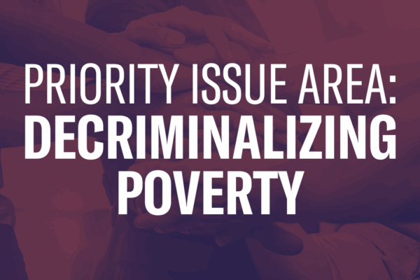 The text "Priority Issue Area: Decriminalizing Poverty" on top of a photo of hands