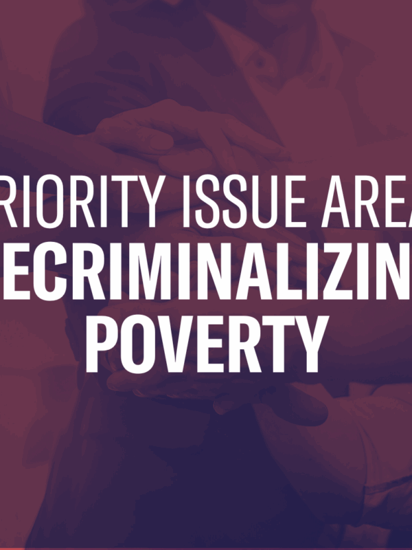 The text "Priority Issue Area: Decriminalizing Poverty" on top of a photo of hands