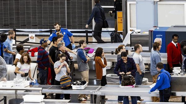 Photo of people waiting in the security line at an airport