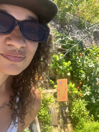 ACLU's Khadija Davis in her community garden in Missoula.